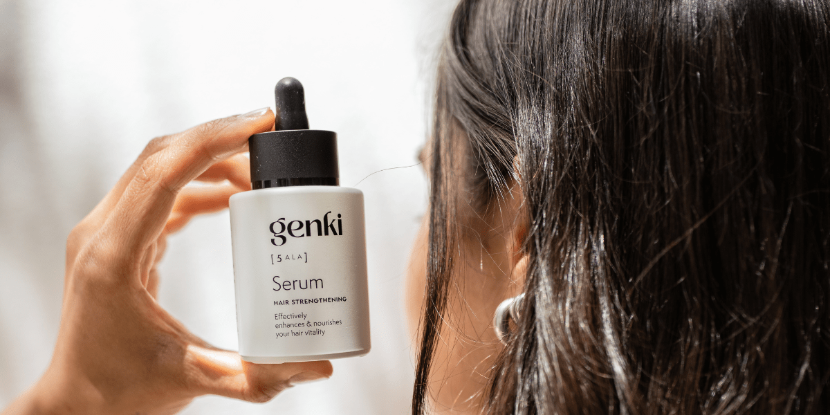 genki_haircare_serum_frau_hinterkopf_badezimmer.png